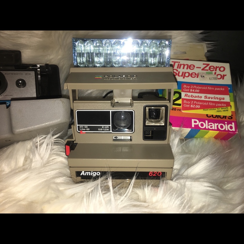 4 FOR 1. VINTAGE POLAROID CAMERAS